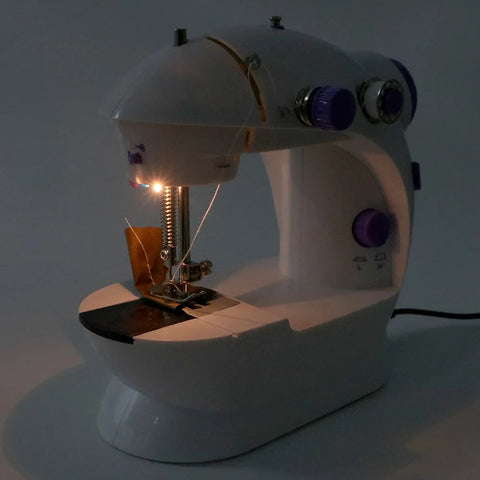 Image of MINIMÁQUINA DE COSER CON TABLERO PÓRTATIL